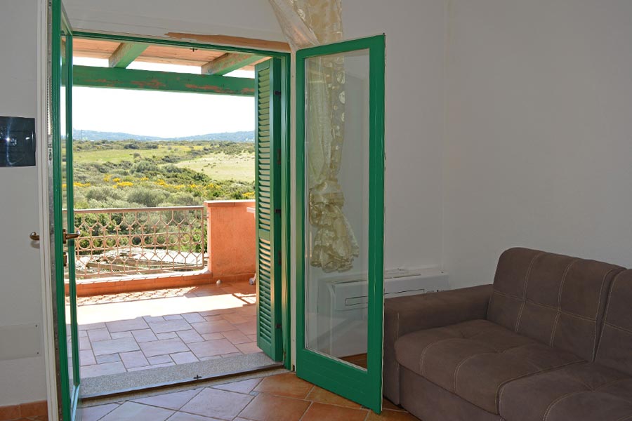 Villaggio Zodiaco divano appartamento Zodiaco 20 Sardegna - Il giglio di mare